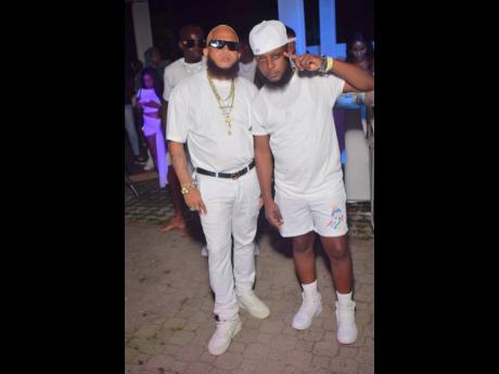 Long-time friends Gaps 7 (left) and Black Blingaz boss pause for a quick flex.