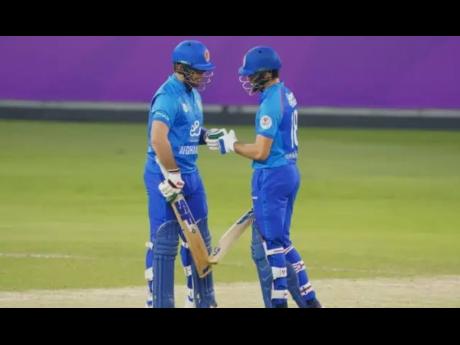 Darwish Rasooli (left) and Ibrahim Zadran both scored half centuries for Afghanistan in their win over the West Indies.