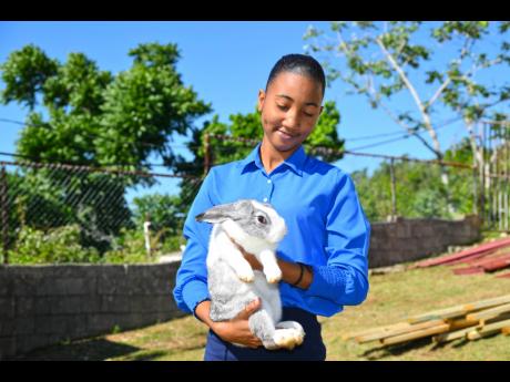 Credit: Contributed Paris Guthrie caring for her soft, fuzzy companion.