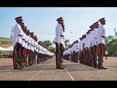 Newly minted constables at the Jamaica Constabulary Force passing-out parade and awards ceremony at the National Police College of Jamaica in Twickenham Park, St Catherine, on Wednesday.