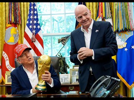 Credit: AP United States president Donald Trump (left) with FIFA president Gianni Infantino.