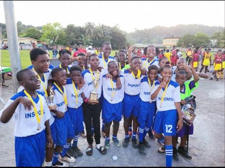 Institute of Sports Portland Primary Schools football champions Seaside Primary rejoice in their triumph. Seaside defeated defending champions Port Antonio Primary 1-0 in the second leg final on Friday, January 23, for a 2-0 aggregate win.