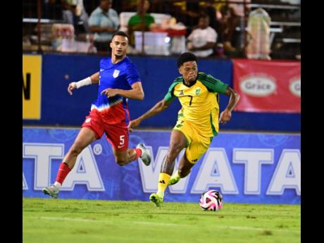 Jamaica’s Leon Bailey in action, dribbling away from the United States’ Antonee Robinson during the Concacaf Nations League semi-final at the National Stadium in Kingston on Thursday, November 14, 2024. 