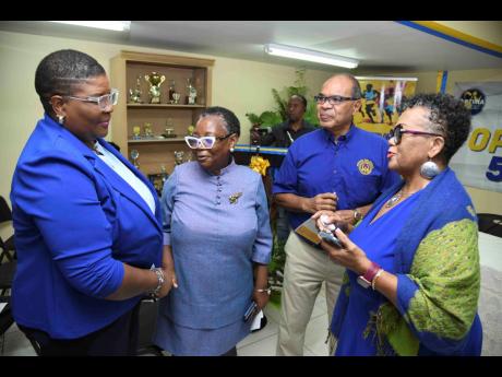 Credit: Antoine Lodge From left: Sian-Mahay Wilson, past student of Ardenne High School and principal of Calabar High School; Dr. Jacqueline Pinto, acting principal at Ardenne High School; Michael Clarke, past student of Ardenne High and Esther Tyson, chairperson of the Optima 5k run/walk committee at the launch of the Ardenne Optima Run 5K run/walk held on January 14 at Ardenne High School in Kingston.