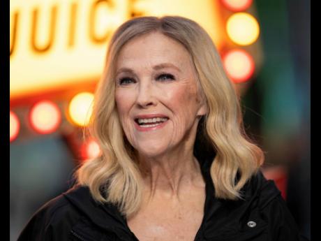 FILE - Catherine O'Hara poses for photographers upon arrival at the UK premiere of "Beetlejuice Beetlejuice" on Thursday, Aug. 29, 2024, in London. (Photo by Scott A Garfitt/Invision/AP)