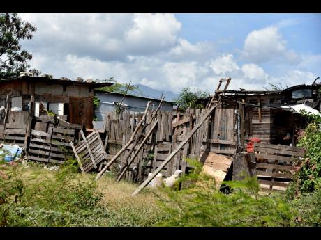 Credit: FILE A squatter community in the Corporate Area.