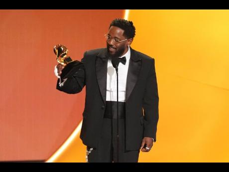 Kendrick Lamar accepts the award for best rap album for ‘GNX’