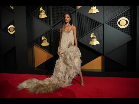 Credit: Jordan Strauss AP Photo
Tyla arrives at the 68th annual Grammy Awards on Sunday, in Los Angeles.