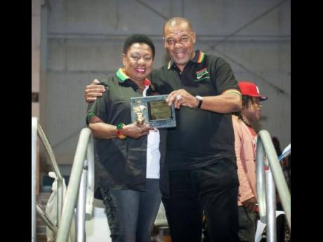 Culture and Entertainment Minister Olivia Grange pictured with Anthony 'Supa Dee' Wilson, the veteran music producer, promoter and sound system operator remembered for his role in Jamaica’s sound clash era.