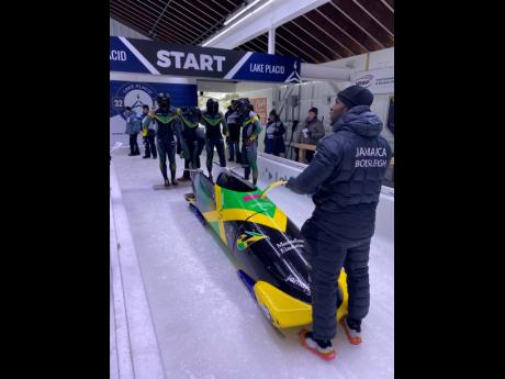 Members of the Jamaica four-man bobsled team ahead of action at the recent North American Cup.