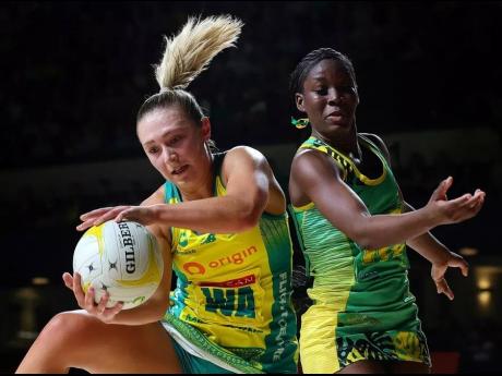 Credit: Courtesy of Netball Australia Action between Australia and Jamaica during a three-Test series in that country.