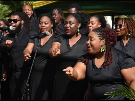 Credit: Ian Allen Members of Nexus Performing Arts Company deliver a rendition in honour of National Hero Sir Alexander Bustamante to commemorate the 142nd anniversary of his birth at National Heroes Park in Kingston on Tuesday.