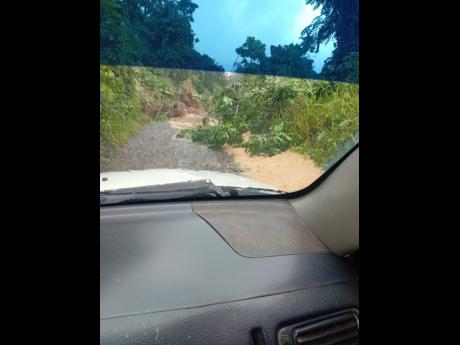 A section of Long Road in Southeast St Mary, which is blocked due to a landslide. 
