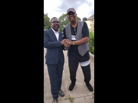 Jackie Jackson (right) and singer Bitty McLean at the thanksgiving service for drummer Sly Dunbar at Holy Trinity Cathedral in Kingston on March 7.