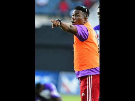 JC’s U16 head coach Raymond Watson