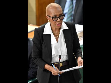 Finance Minister Fayval Williams opens the Budget Debate in Gordon House on Tuesday.