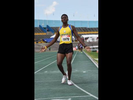 Titchfield High School’s Ratieo Walters claims the boys’ Class Two 800 metres at the ISSA Eastern Athletics Championships in a meet record 1:59.66 at the National Stadium.