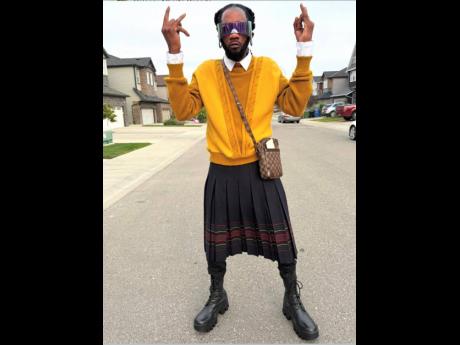 Credit: Contributed Shizzle Sherlock dons Scottish-style kilt.