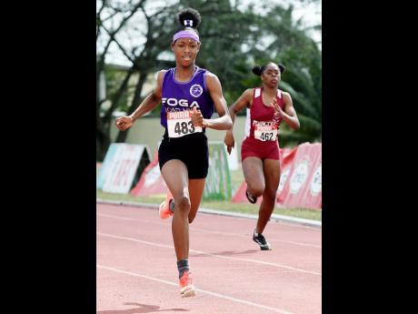 Shameika McLean of Foga Road High School winning the Class Two girls’ 200 metres final in 24.14 seconds at the ISSA Central Athletics Championships at G.C. Foster College of Physical Education and Sport on Wednesday, February 25.