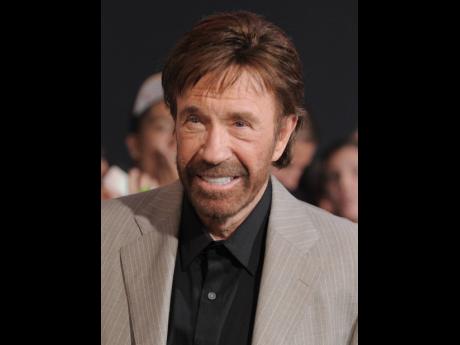 FILE - Chuck Norris attends the premiere for "The Expendables 2" on Aug. 15, 2012 in Los Angeles. (Photo by Jordan Strauss/Invision/AP, File)