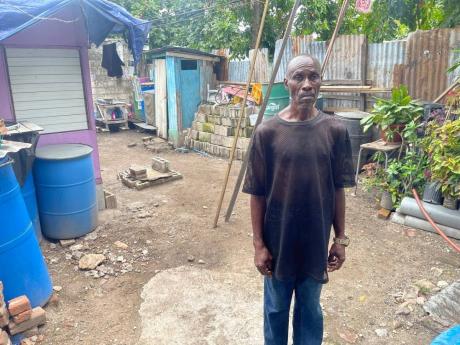 Deron Daley prepares to leave home in search of work, hoping to earn enough to feed his three sons.