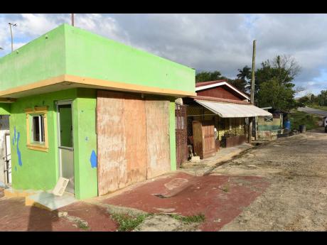 These buildings were submerged by rising floodwaters in Content, Manchester, last October.