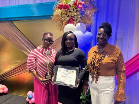 Credit: Tiffany Pryce LASCO Teacher of the Year runner-up Shaneika Davidon Francis (centre) celebrates her placing with her sister Tina Anderson (left), and mom Cynthia Ellis Tucker. The awards ceremony was held on Wednesday at The Jamaica Pegasus hotel in New Kingston.
