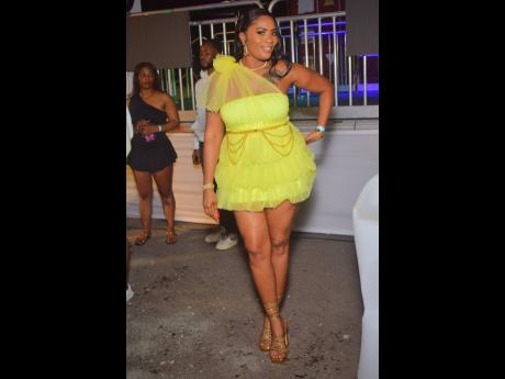 Aesha sparkles in this yellow ensemble at Shanty Star Flex’s birthday party, held recently aboard the ‘Caribbean Queen’, docked in Kingston Harbour.