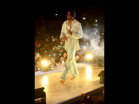 Alkaline commands the stage early Sunday morning at Up To The Line, the After Champs party, held at the Police Officers’ Club, Hope Road, St Andrew.
