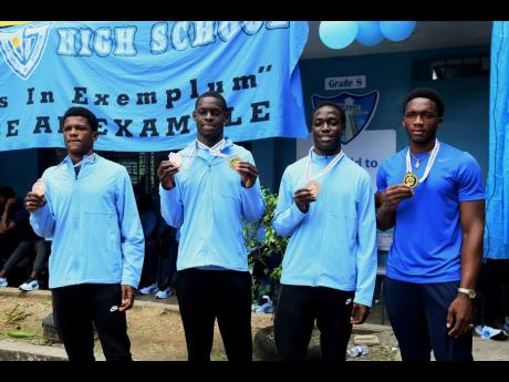 Members of Edwin Allen High School’s male track and field team at the school’s 2026 Champs celebrations.