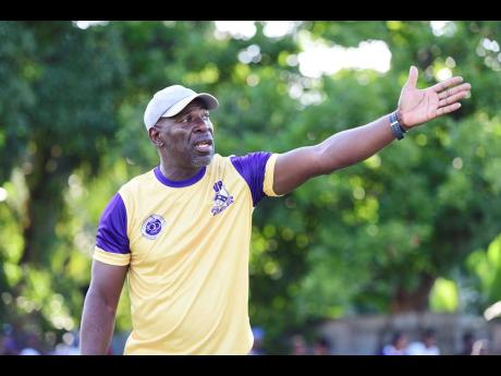 Credit: Antoine Lodge Vassell Reynolds dictating instructions to players during a Kingston College Manning Cup football match against Penwood High School at Maverley playing field on September 9, 2024..