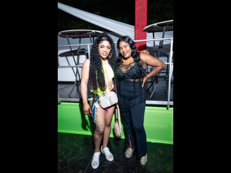 Gal pals Debbie Graha (left) and Kadian McLeod were in for some good vibes at Magnum Riva Bash held at Pennants River on Friday.