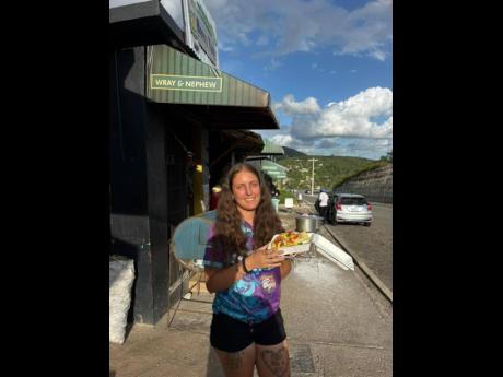 Zoe Reeve gets some grub at Melrose Hill Yam Park during her latest trip to Jamaica.