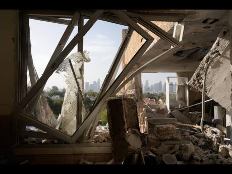 Credit: Maya Levin A damaged apartment in Tel Aviv, Israel, following an Iranian missile strike last month. (AP Photo/Maya Levin)