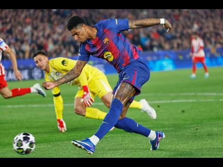 Barcelona’s Marcus Rashford makes an attempt to score during the Champions League quarterfinal first leg soccer match against Atletico Madrid in Barcelona, Spain, on Wednesday.