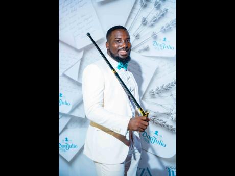 Credit: Contributed HR manager Nicholas Francis stands out with a sharp white look.