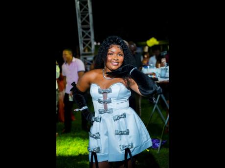 Credit: Contributed Admin assistant Oneilia Francis strikes a playful pose for the lens.