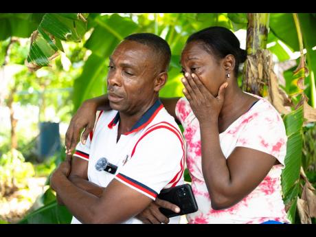 Isaac Bryan and his sister, Suszett Bryan, mourning the tragic loss of their father, 90-year-old Raphael Bryan.