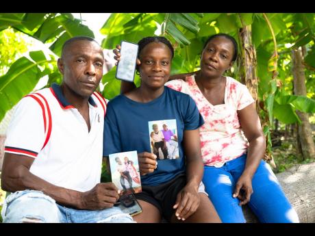From left: Isaac Bryan (son) Shakera Bryan (granddaughter), and Suszett Bryan, daughter of 90-year-old Raphael Bryan, speak on the devastating loss of their father, who fell to his death through a hole in the Easington Bridge in St Thomas on Good Friday.