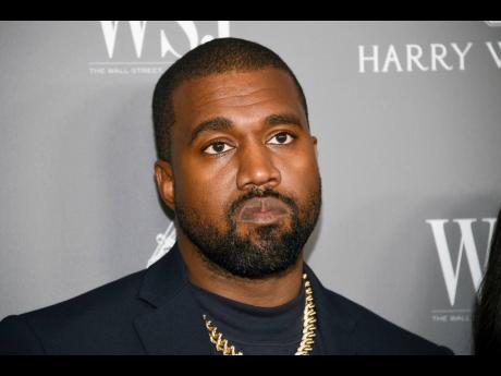 FILE - In this Nov. 6, 2019, file photo, Kanye West, who changed his name to Ye in 2021, appears at the WSJ. Magazine 2019 Innovator Awards at the Museum of Modern Art in New York on Nov. 6, 2019. (Photo by Evan Agostini/Invision/AP, File)