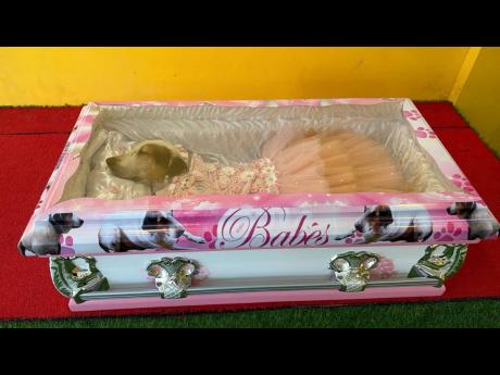 Credit: Contributed Babes lies in her coffin at Perry’s Funeral Home before her burial which is scheduled for today.