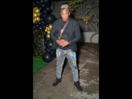 Dancehall artiste Carlton ‘ReniGAD’ Williams supports reggae star Sizzla on his big day.