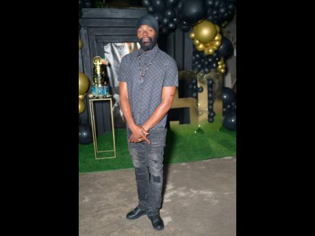 Dancehall and reggae artiste Bugle is militant in black. 
