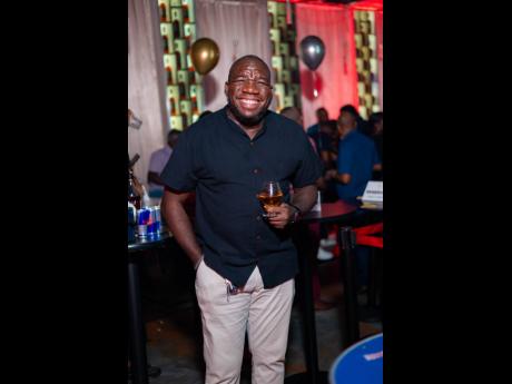 Michael ‘Fada Mike’ Gordon joins the stream of well-wishers turning up at the entertainment boss’s birthday celebration on Thursday.