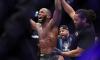 Leon Edwards celebrates his victory over Kamaru Usman in the the welterweight title bout at the UFC 286 mixed martial arts event on Saturday. 
